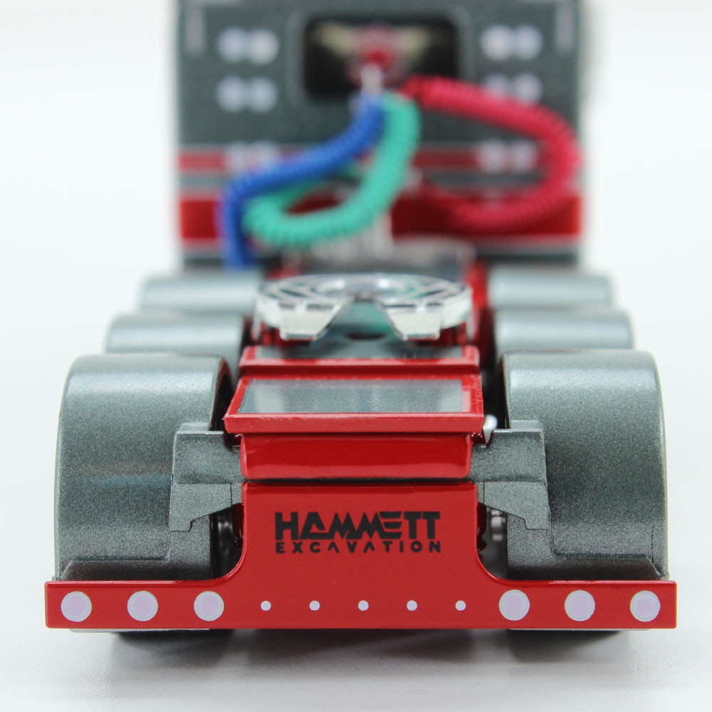 69-0900: Big Rigs #3: Hammett Excavation 
1/64 scale Peterbilt Model 389 63" Flat Top Sleeper with Fontaine Magnitude Tri-Axle Lowboy Trailer