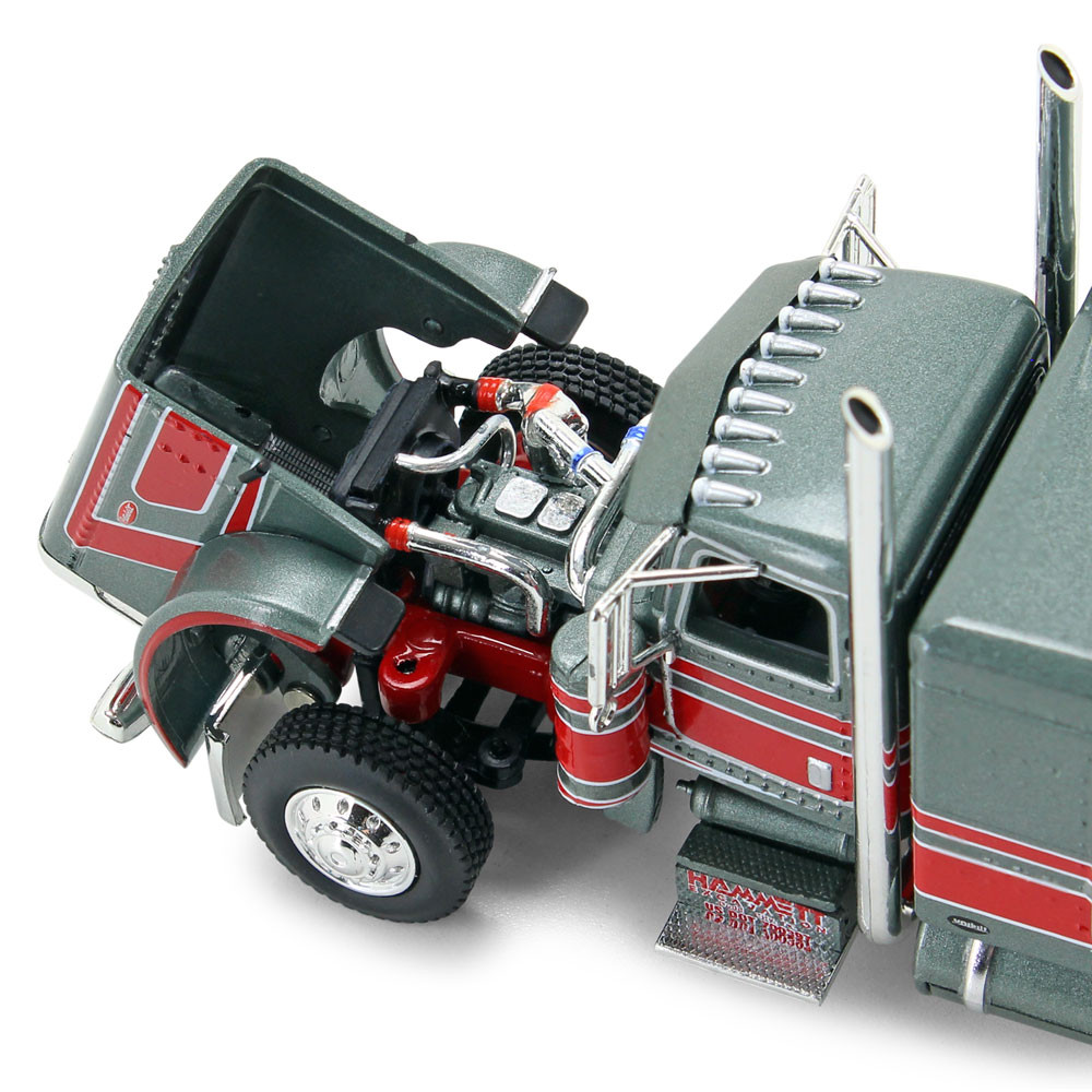 69-0900: Big Rigs #3: Hammett Excavation 
1/64 scale Peterbilt Model 389 63" Flat Top Sleeper with Fontaine Magnitude Tri-Axle Lowboy Trailer